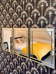 a bedroom with a bunk bed with a mirror at Guest House 5 Beds 4 En-suites Middlesbrough in Middlesbrough