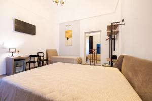 Letto o letti in una camera di Lucrezia Dimore - Ugento