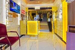 TV a/nebo společenská místnost v ubytování Trans World Hotel