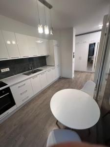 Køkken eller tekøkken på Corporate One Room Pipera