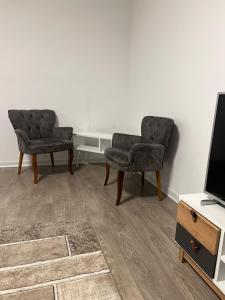 Et tv og/eller underholdning på Corporate One Room Pipera