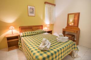 Letto o letti in una camera di Horizon Apartments Gozo