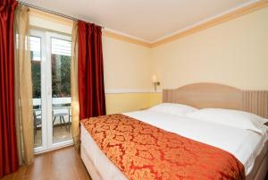 Postel nebo postele na pokoji v ubytování Amadria Park Apartments Šibenik