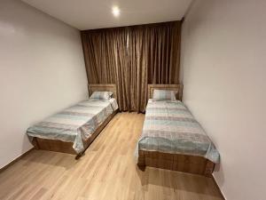 Tempat tidur dalam kamar di Appart de luxe 27 ILOT9
