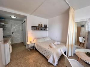 Posteľ alebo postele v izbe v ubytovaní estudio El Faro