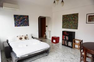 Кровать или кровати в номере Appartamento vista San Pietro