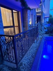 a balcony of a house at night at Studio CASCADAS FAMILY RESORT in Sunny Beach