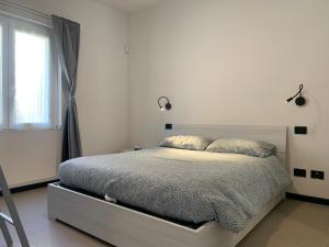Letto o letti in una camera di VILLA BOEL Bergamo