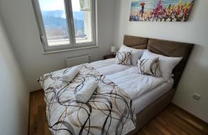 Postel nebo postele na pokoji v ubytování Ada Nostra