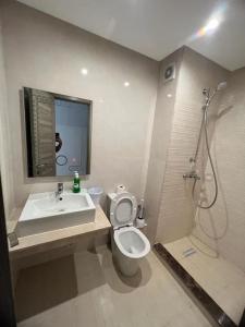 a bathroom with a sink and a toilet and a shower at Appart haut standing coralia 14 in Oujda