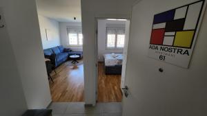 Postel nebo postele na pokoji v ubytování Ada Nostra
