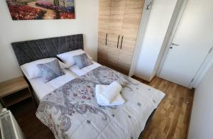 Postel nebo postele na pokoji v ubytování Ada Nostra