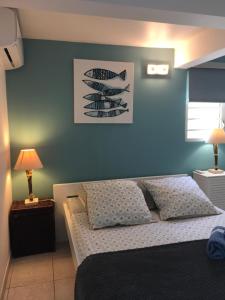 Postel nebo postele na pokoji v ubytování Appartement style Caribeen