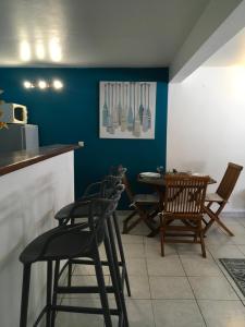 TV o dispositivi per l'intrattenimento presso Appartement style Caribeen