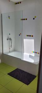 a bathroom with a sink and a glass shower at APARTAMENTOS FRERS in Martínez +16 photos