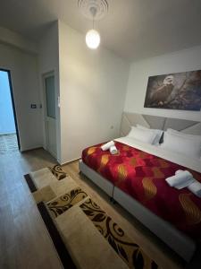 Katil atau katil-katil dalam bilik di Hotel Bar-Restorant Fresku