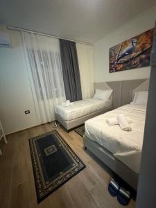 Postelja oz. postelje v sobi nastanitve Hotel Bar-Restorant Fresku