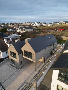 an aerial view of a house with a roof at Prospect View in Portstewart