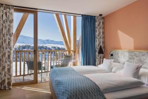Postel nebo postele na pokoji v ubytování ICARO Hotel + 37 fotografií