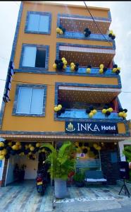 a building with a hotel with fruit on it at INKA HOTEL in Cúcuta