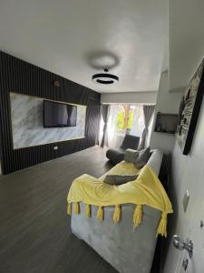 Ένα ή περισσότερα κρεβάτια σε δωμάτιο στο Río Dorado Apartamento Boutique