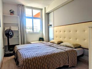 Posteľ alebo postele v izbe v ubytovaní COZY Residence