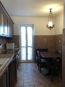 Kuchyň nebo kuchyňský kout v ubytování La Villetta del Gelso bianco + 52 fotografií