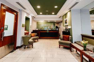 a lobby with chairs and a waiting room at Drury Court Hotel in Dublin