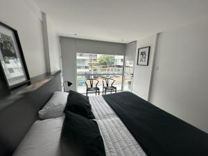 Posezení v ubytování La pedrera Departamentos de lujo en la ciudad Cultural