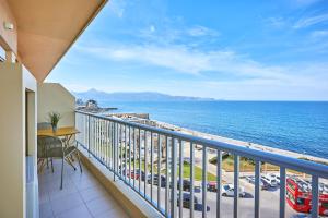 a balcony with a view of the ocean at Crete - Heraklion Sea View Apartment 1 in Heraklio Town