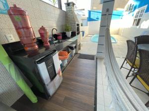 Dapur atau dapur kecil di Casa para Família com Lazer Total - Próximo Aeroporto