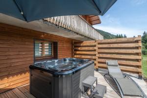 Fotografie z fotogalerie ubytování Chalets du Bouchot & Jacuzzi privatif proximité Gerardmer & La Bresse v destinaci Rochesson