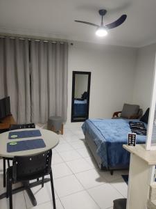 Ένα ή περισσότερα κρεβάτια σε δωμάτιο στο Studio 1315 Campinas SP
