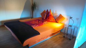 Tempat tidur dalam kamar di Appartement Wohlfartstätter