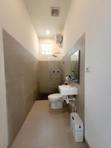 Ein Badezimmer in der Unterkunft Villa Moana Sari