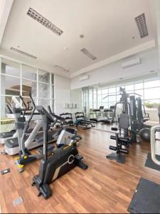 a gym with several treadmills and cardio machines at Golf Resort View at Kaina Tower Nuvasa Bay 9B22 in Nongsa
