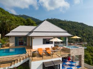 a villa with a swimming pool and a resort at Tropical Villa 3 in Lamai