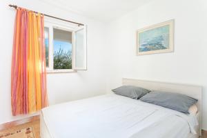 Postel nebo postele na pokoji v ubytování Apartment Sevid 4287d