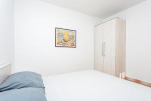 Postel nebo postele na pokoji v ubytování Apartment Sevid 4287d
