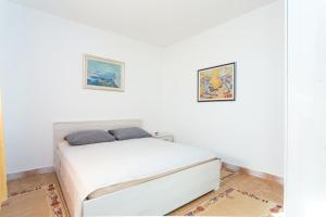 Postel nebo postele na pokoji v ubytování Apartment Sevid 4287d