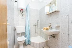 Koupelna v ubytování Apartment Sevid 4287d
