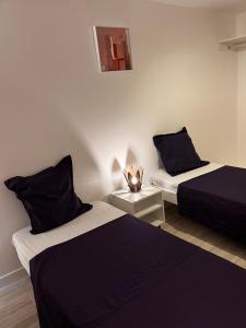 Letto o letti in una camera di Marvelsun