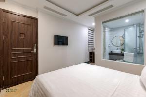 Voodi või voodid majutusasutuse Nature Hotel toas