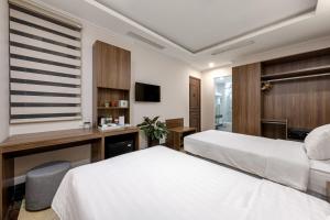 Voodi või voodid majutusasutuse Nature Hotel toas