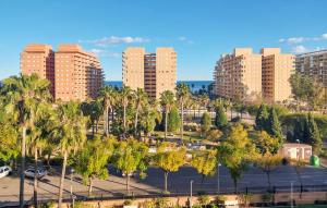 an aerial view of a city with tall buildings at 2 Bedroom Nice Apartment In Oropesa Del Mar in Oropesa del Mar +9 photos