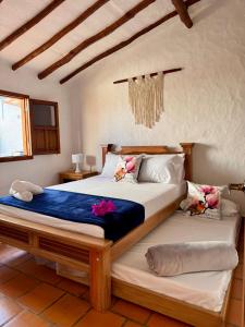 Katil atau katil-katil dalam bilik di Casa La Bonita - Barichara
