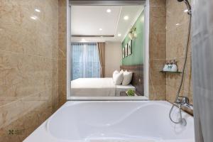 Voodi või voodid majutusasutuse Nature Hotel toas