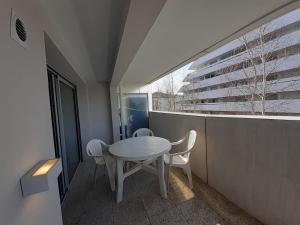 Appartement Anglet, 2 pièces, 4 personnes - FR-1-239-1021 tesisinde bir balkon veya teras