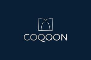 a logo for a company with a book at One Cambridge Residence by COQOON in Manchester