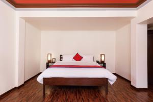 Voodi või voodid majutusasutuse Shambaling Boutique Hotel toas